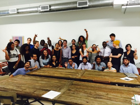 Justin Wales (standing at center in collared shirt) is "changing the way Miami does politics." (Photo courtesy of Justin Wales)